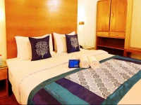 OYO Premium AM Road Near Tata Tea Ground