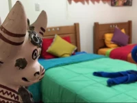 Mundo Albergue La Perla