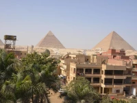 Three Giza pyramids inn