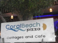 Coral Beach Pizza Cottages