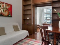 Apartamento com vista lateral do mar