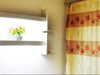 Shenglong Xianju Apartment Hotel